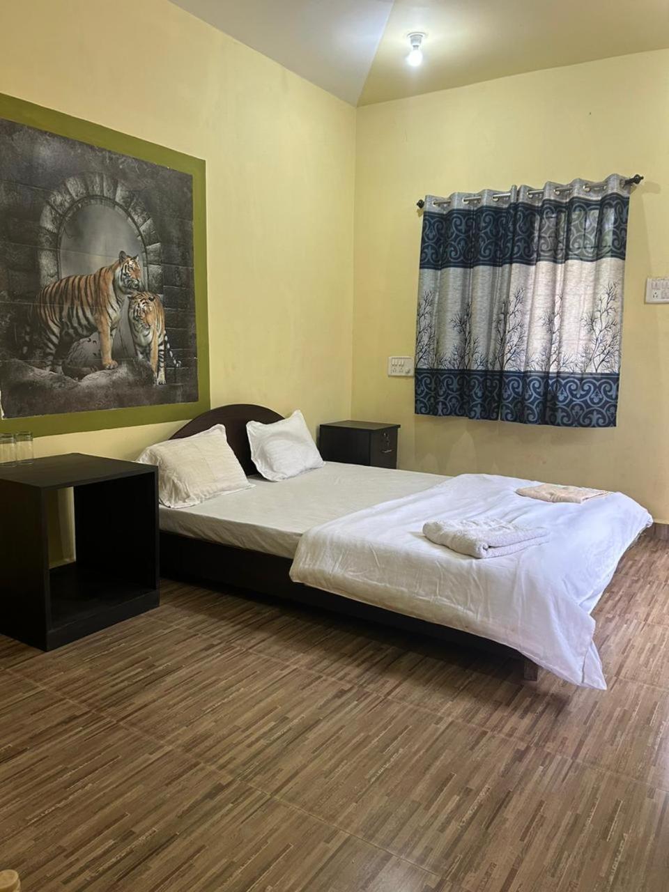 One Love Guest House Morjim Bagian luar foto